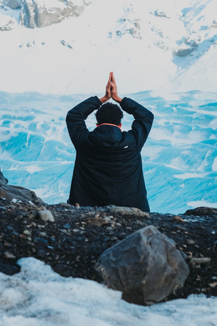 Unrecognizable Man Explorer Doing Yoga Asana