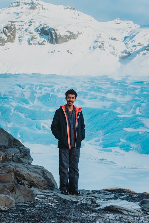 Man standing on mountain slope