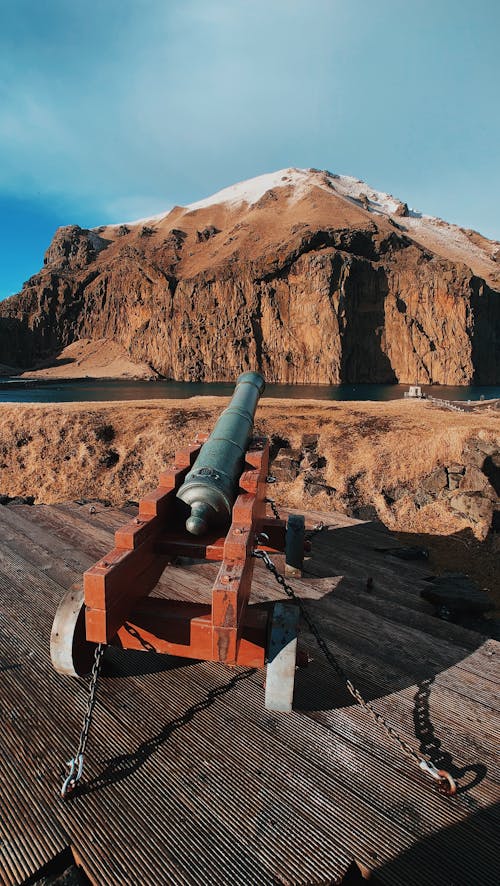 Free Aged cannon on terrace in mountains Stock Photo