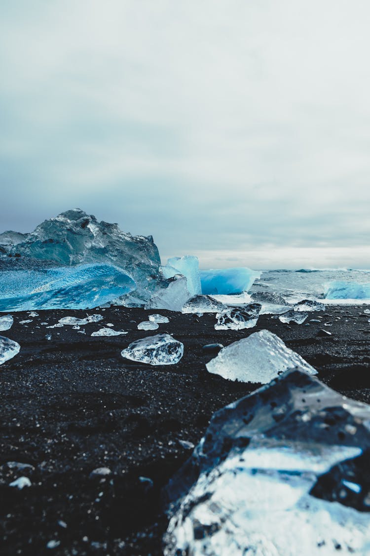 Ice On Black Beach In North