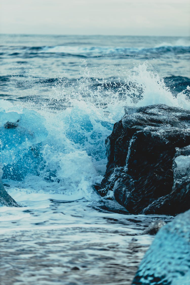 Stormy Cold Ocean Waves And Rocks