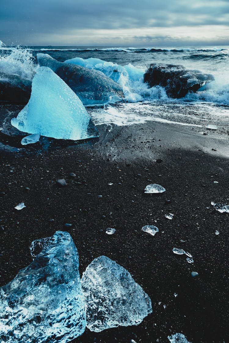 Cold Crystal Chunks Of Ice On Seashore