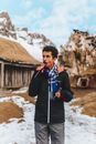 Man sucking clear icicle in nature