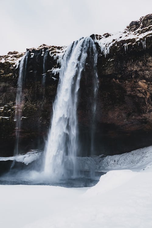 Free Rapid foamy cascade in high ridge in wintertime Stock Photo