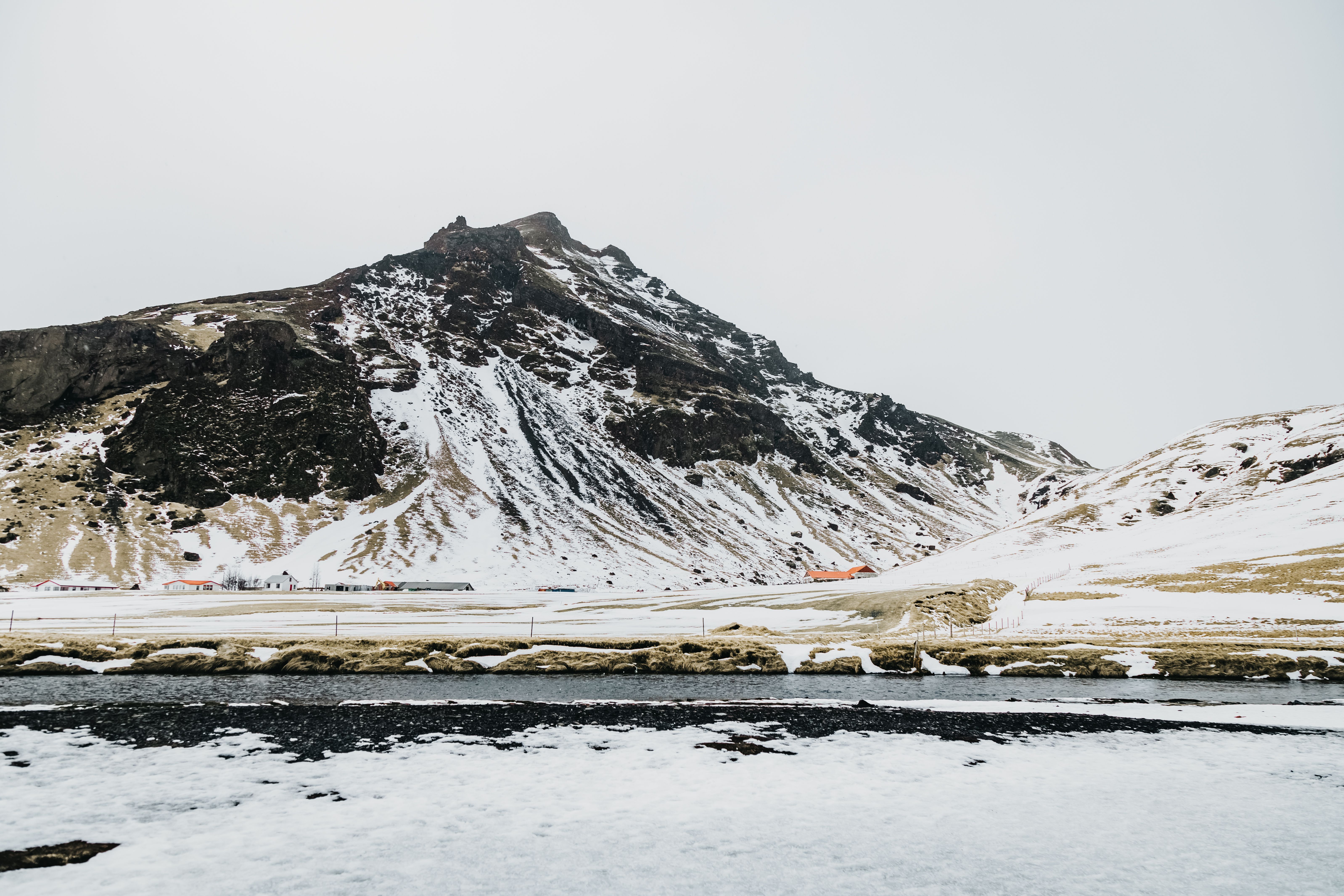 Reykjavik harbour with snowy mountains behind