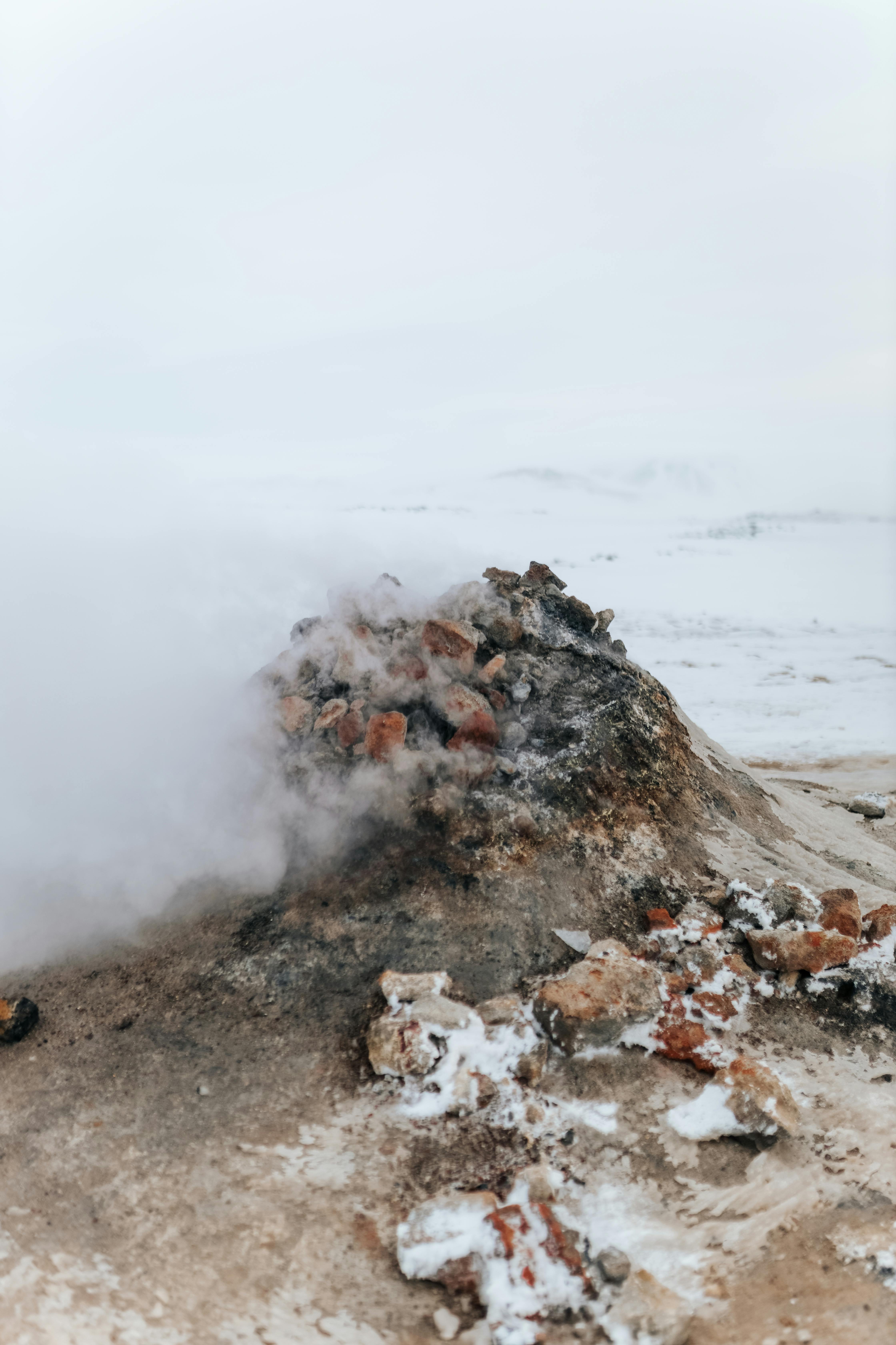 slope on beach behind ocean in foggy weather in winter