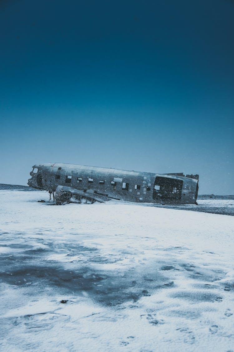 Abandoned Plane After Accident On Snowy Land