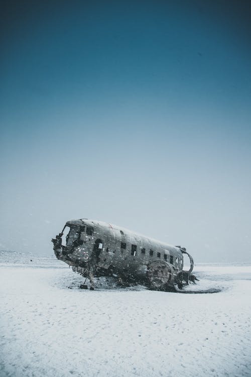 Rough plane after accident on snowy land · Free Stock Photo