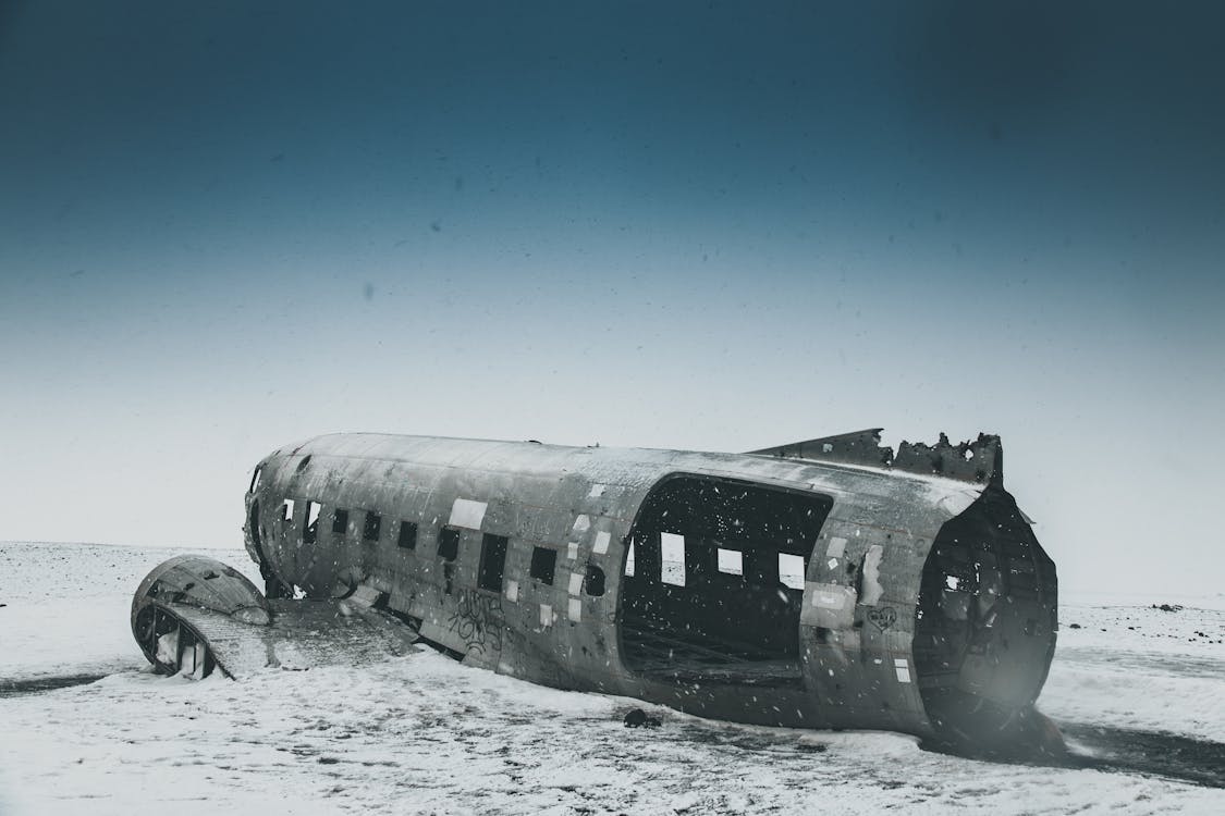 Rough destroyed plane cabin after accident on snow · Free Stock Photo