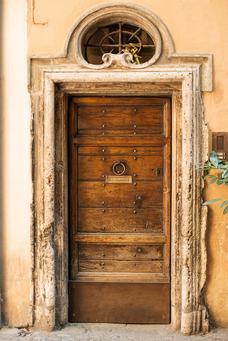 Shabby Wooden Door Of Old Stone House