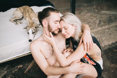 Loving Couple Embracing on Floor