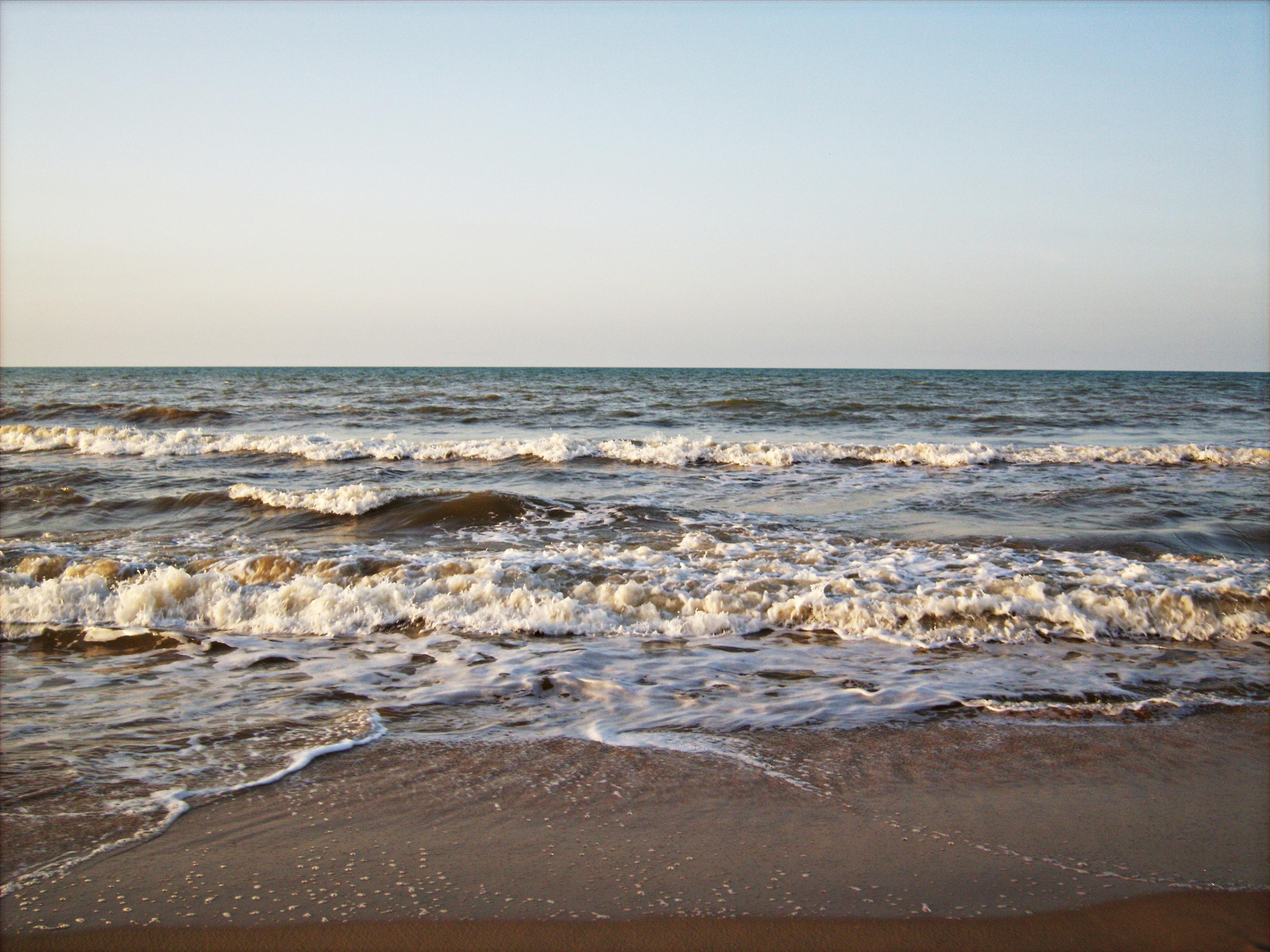 Person typing comment on laptop