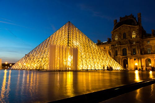 Free Louvre Museum at Night Stock Photo