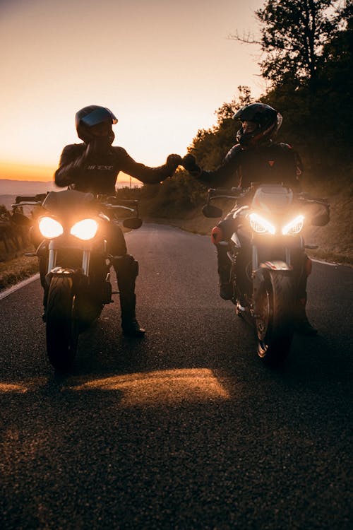 Free Silhouette of Men Riding Motorcycle during Sunset Stock Photo