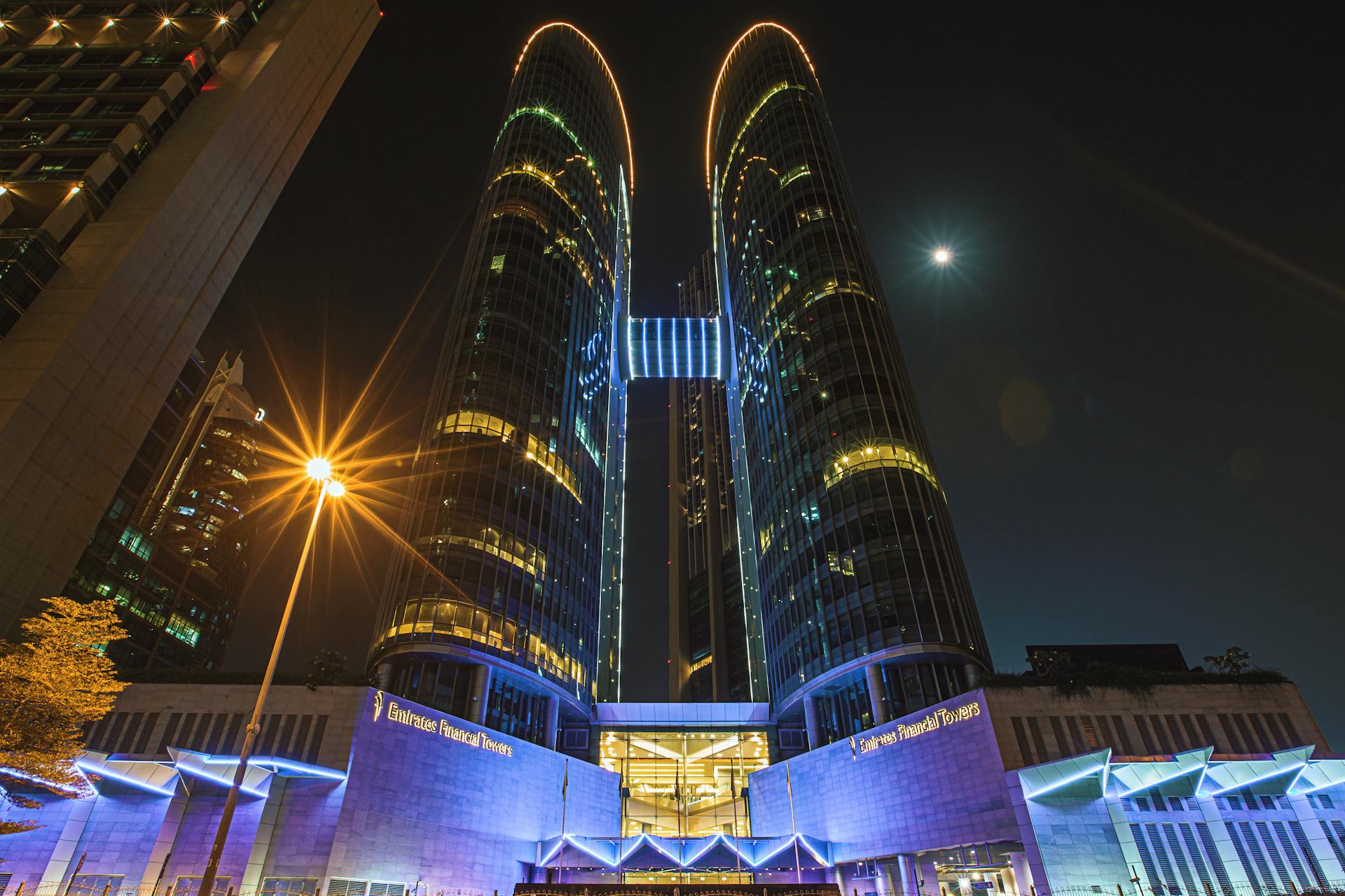 Enchanting night shot of Emirates Financial Towers in Dubai, UAE, illuminated beautifully.