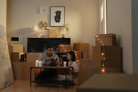 2 Boys Sitting on Chair in Front of Table