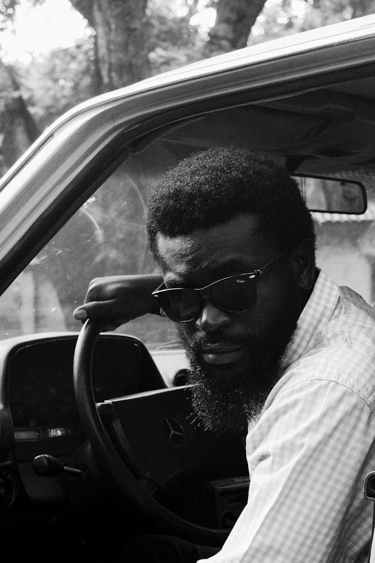 Bearded Black Man In Car