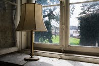 Brown Floor Lamp Near Window