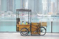 Market Stall with Drinks on Bike on City Street