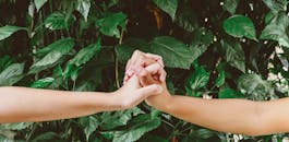 Two People Holding Hands