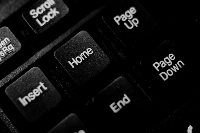 Close-up of dark keyboard keys — Nothing Ahead on Pexels