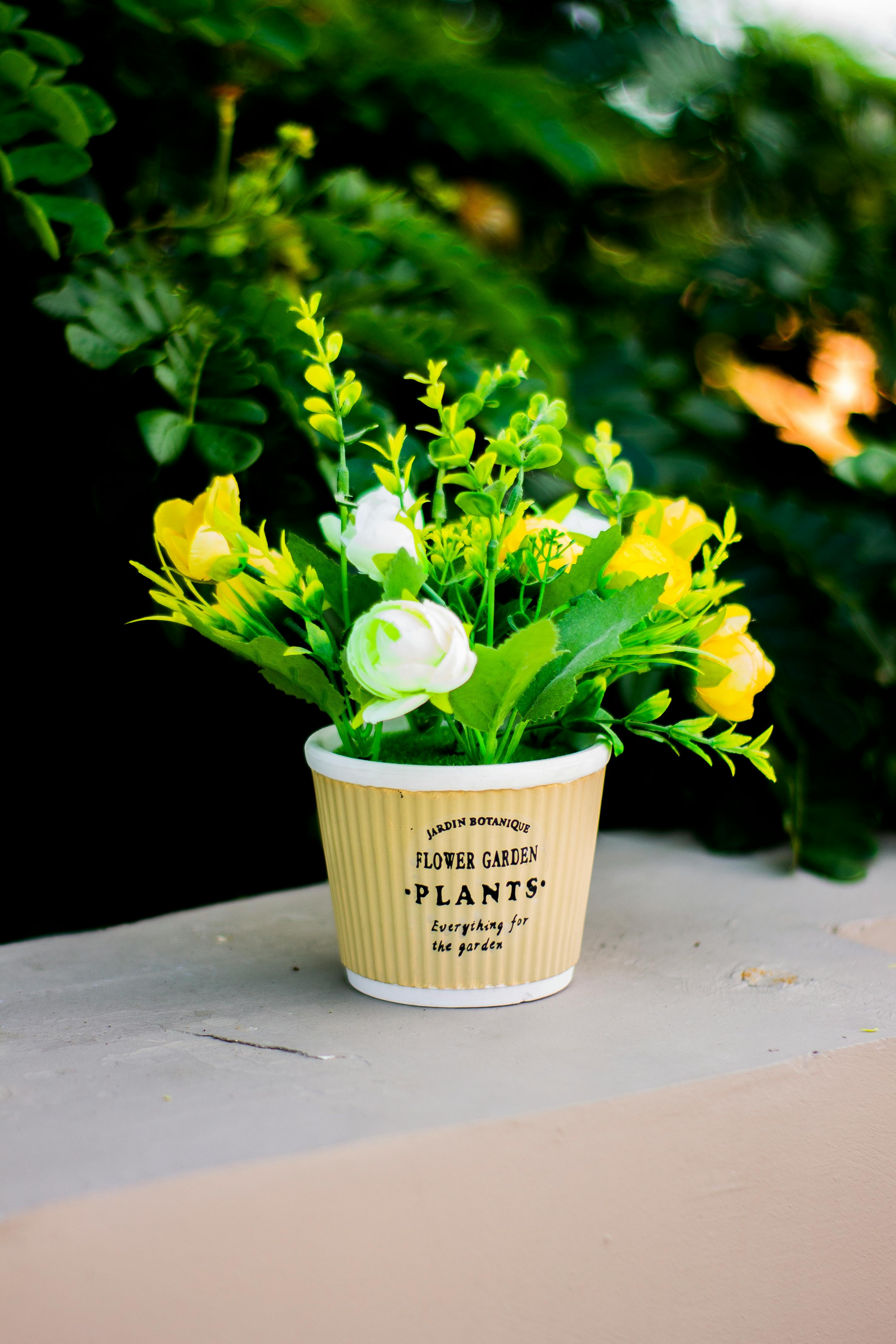 Artificial Flowers on a Flower Pot · Free Stock Photo