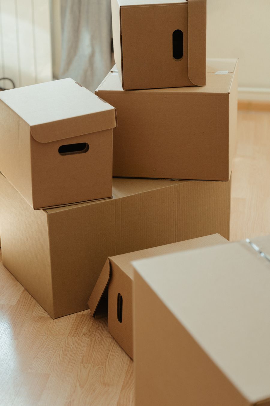 Stack of labelled cardboard boxes ready for a house removal