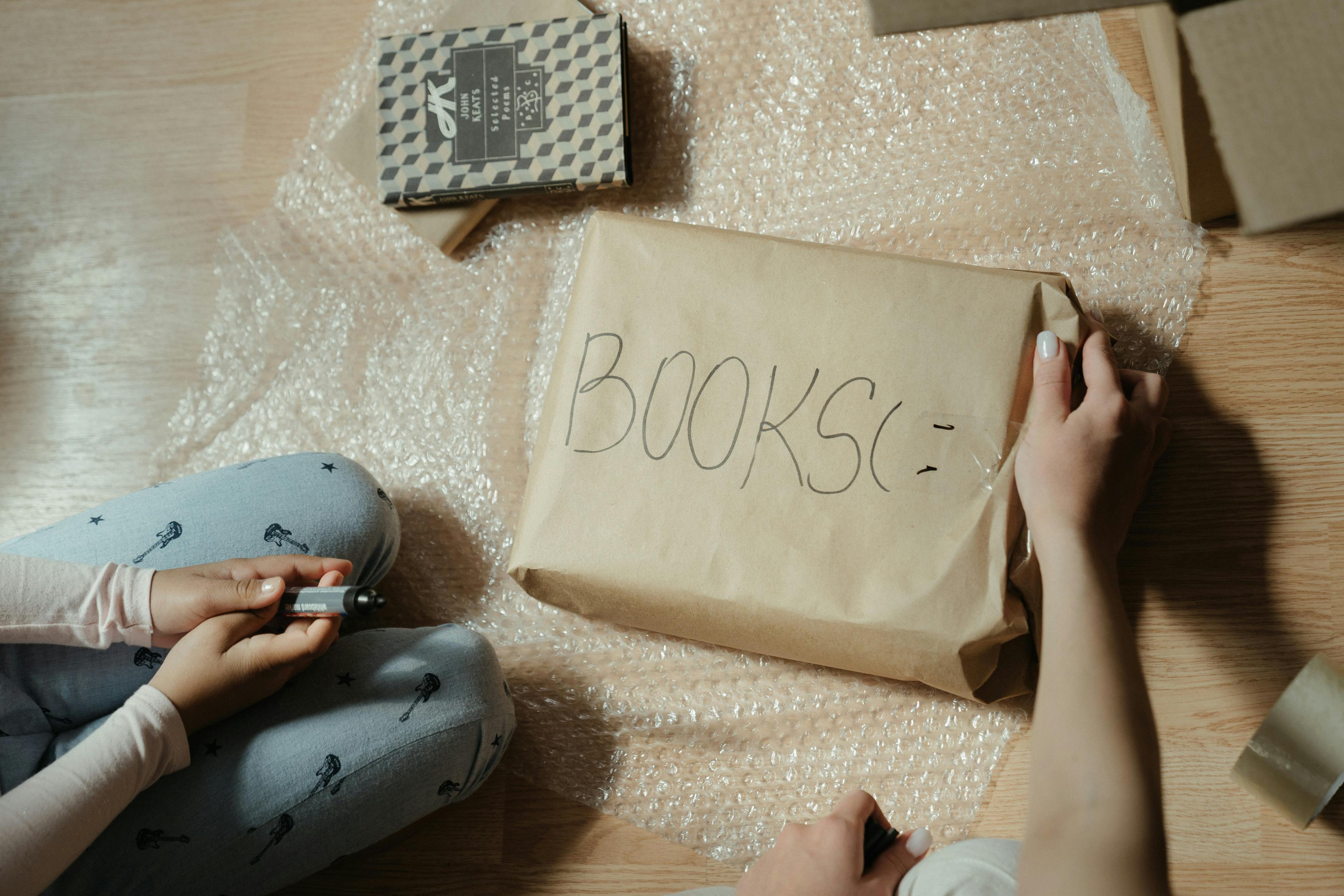 white and black card on brown paper bag