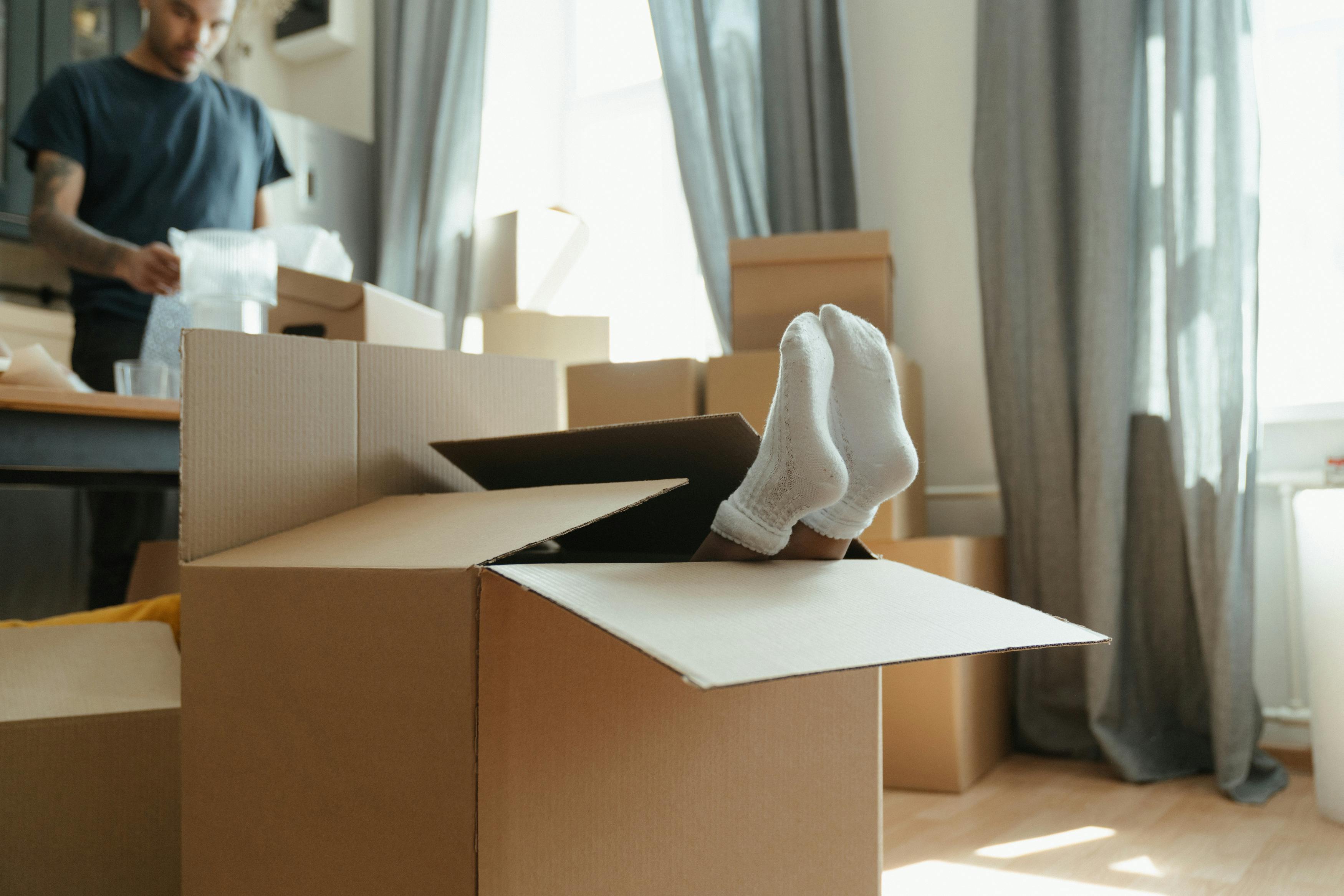 brown cardboard boxes on white table