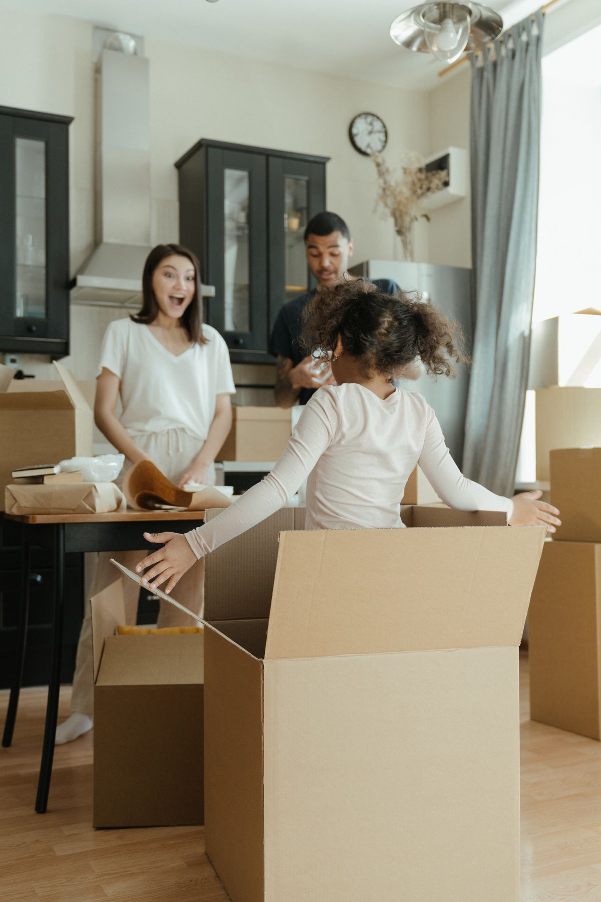 Family unpacking in their new northeast Florida home