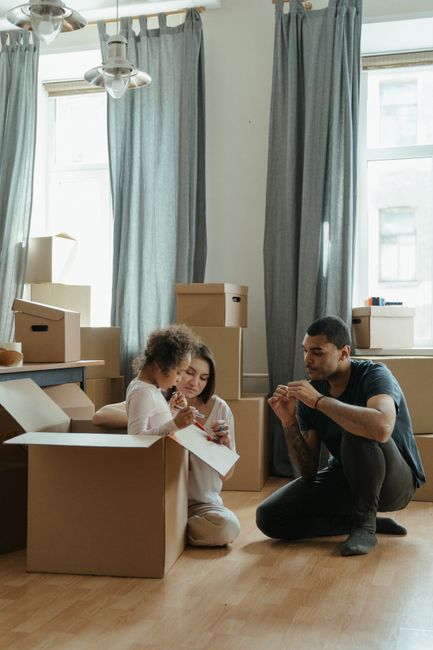 family moving boxes new apartment