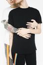 Man Hugging Another Man from Behind