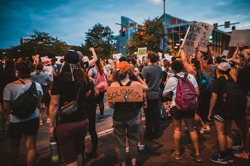 Anonymous demonstrators during anti racism solidarity protest on street