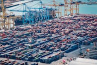 Aerial Photography of Blue and Red Cargo Containers on a Pier