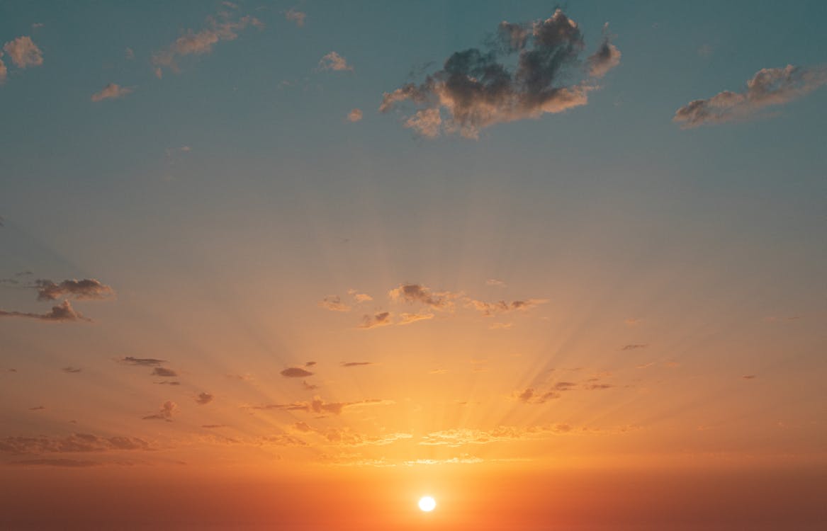 A Beautiful Sunset Sky with Sun · Free Stock Photo