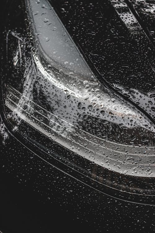 Droplets on headlight of car