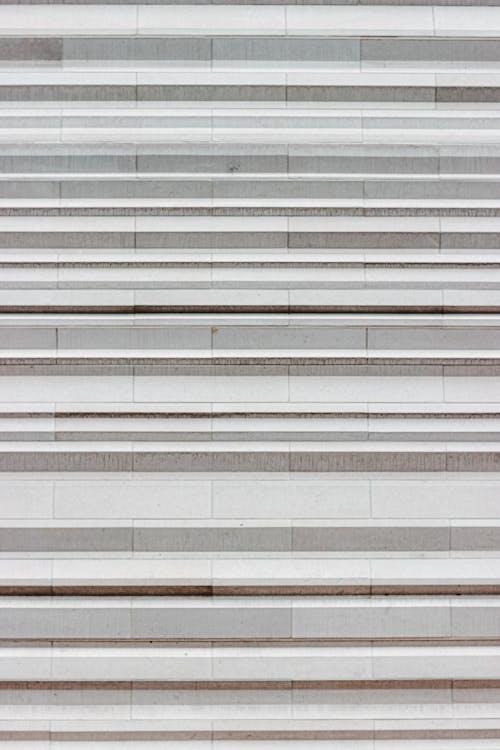 Wall of windowless striped construction