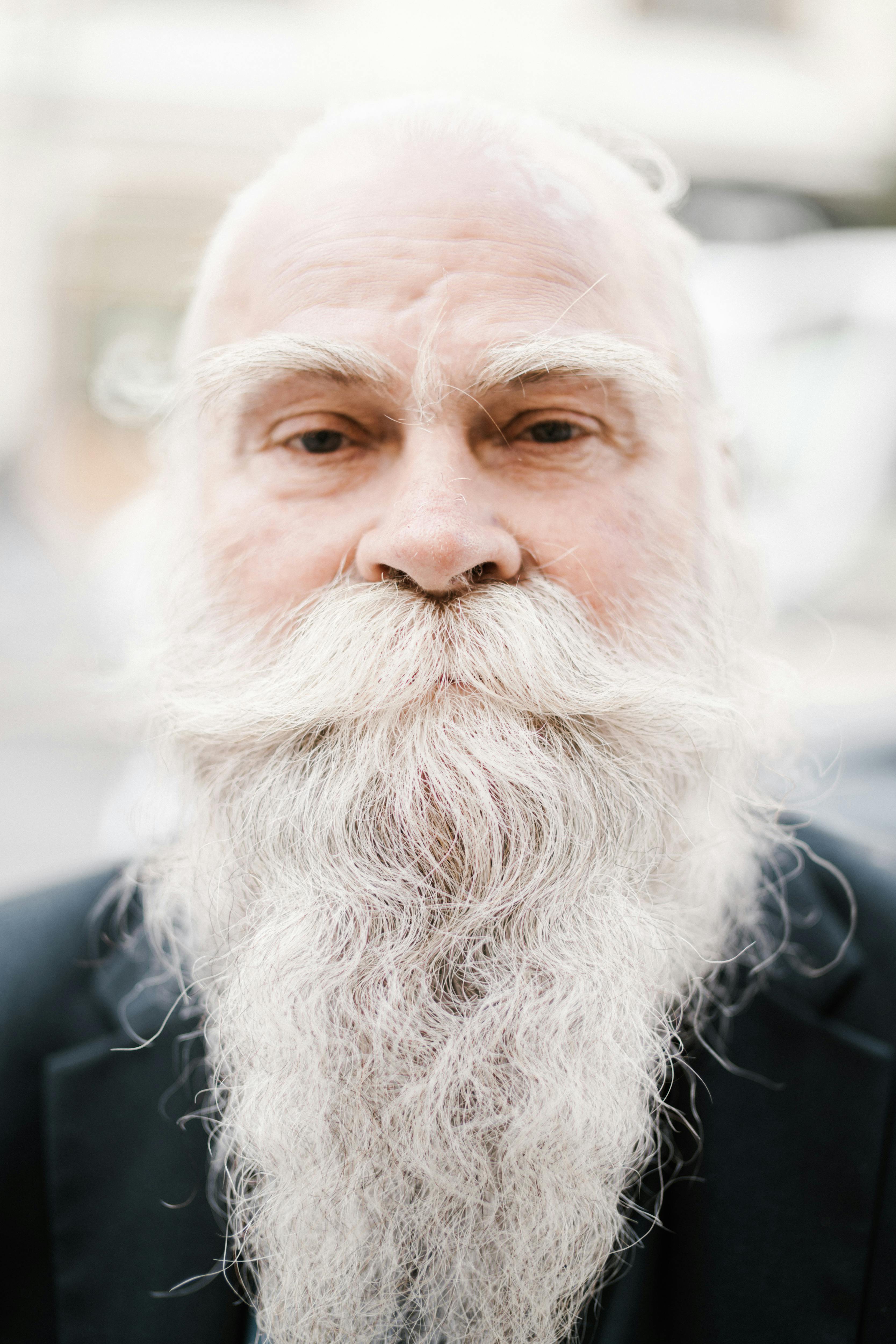 Stylish mature man standing on park staircase · Free Stock Photo