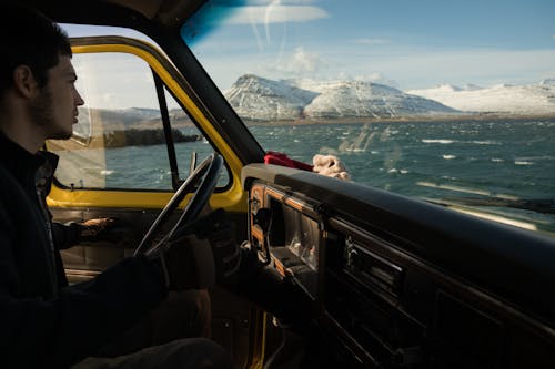 A Man Driving a Car