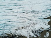White Snow on Body of Water