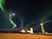 White and Black Ship on Brown Field during Night Time