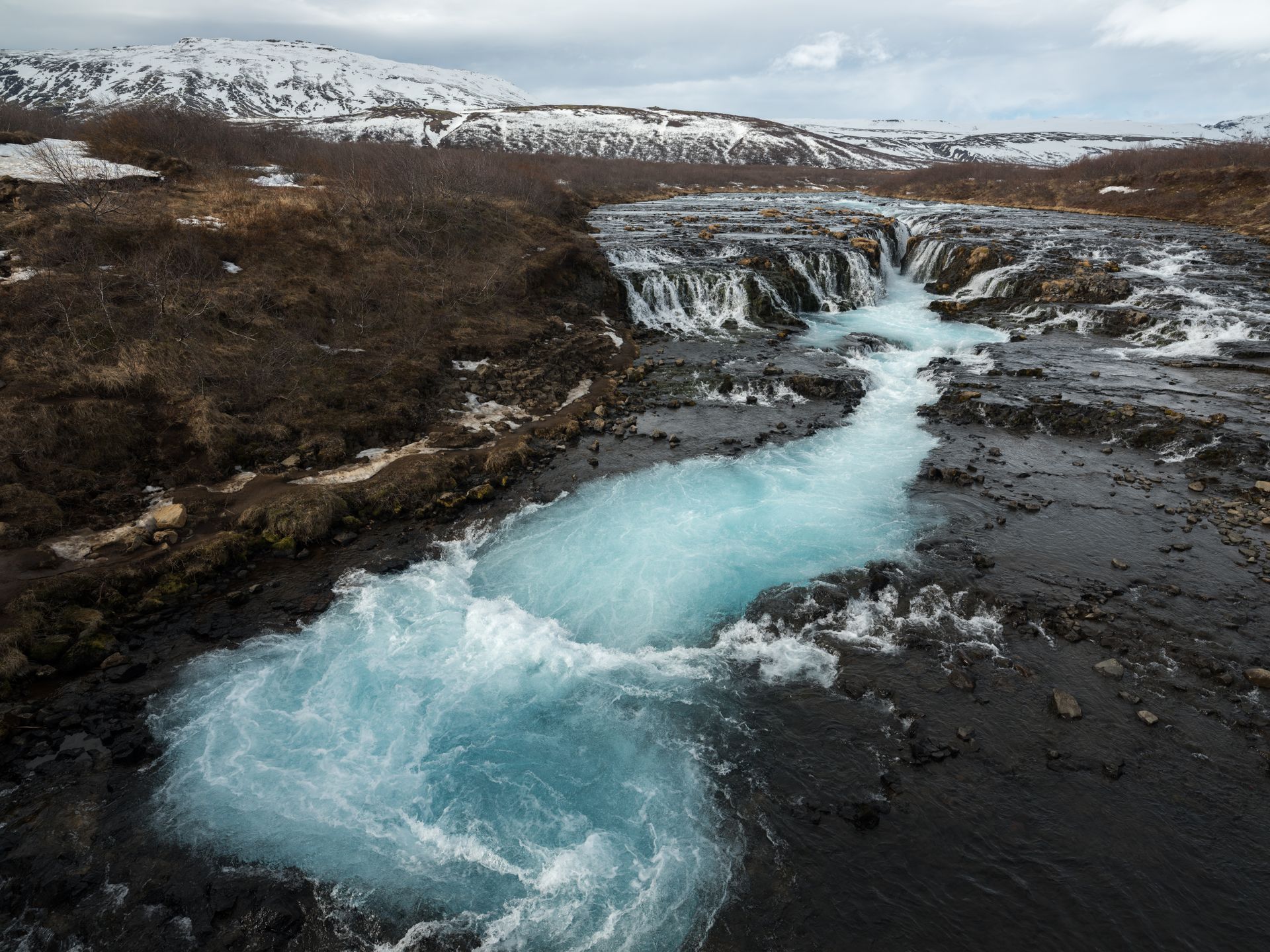 Bruarfoss Waterfall in Winter Mountains