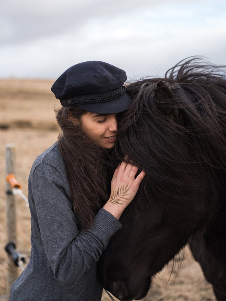 Woman Hugging Horse