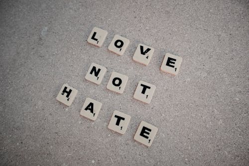 Free Scrabble Tiles Spelling Love Not Hate Stock Photo