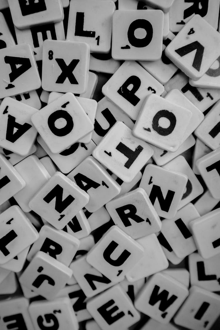 Pile Of Scrabble Tiles With Letters