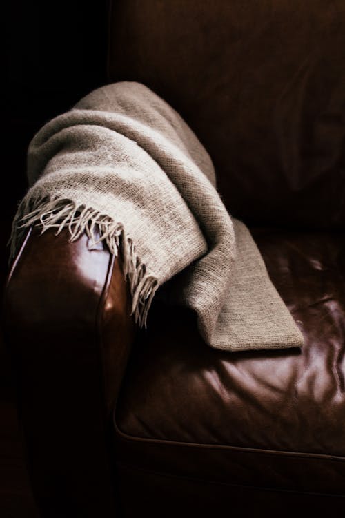 Photo of a Scarf on a Leather Sofa