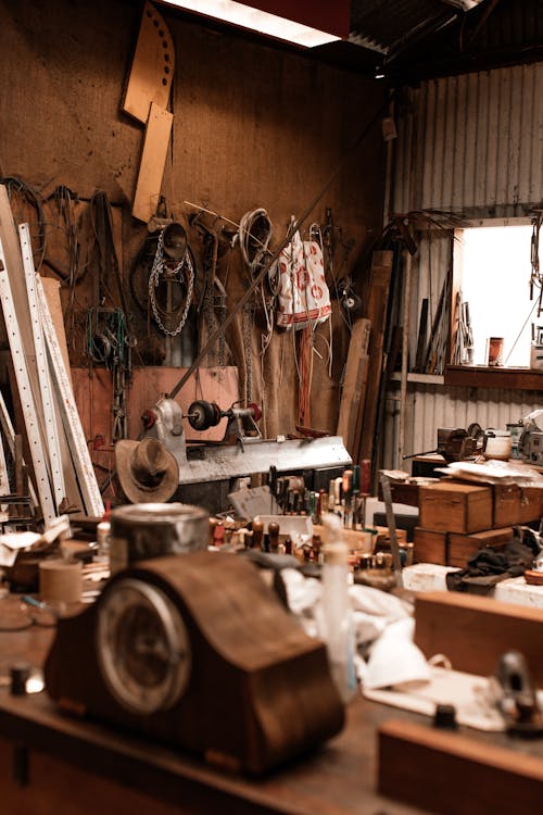 Messy items in old workshop in daytime