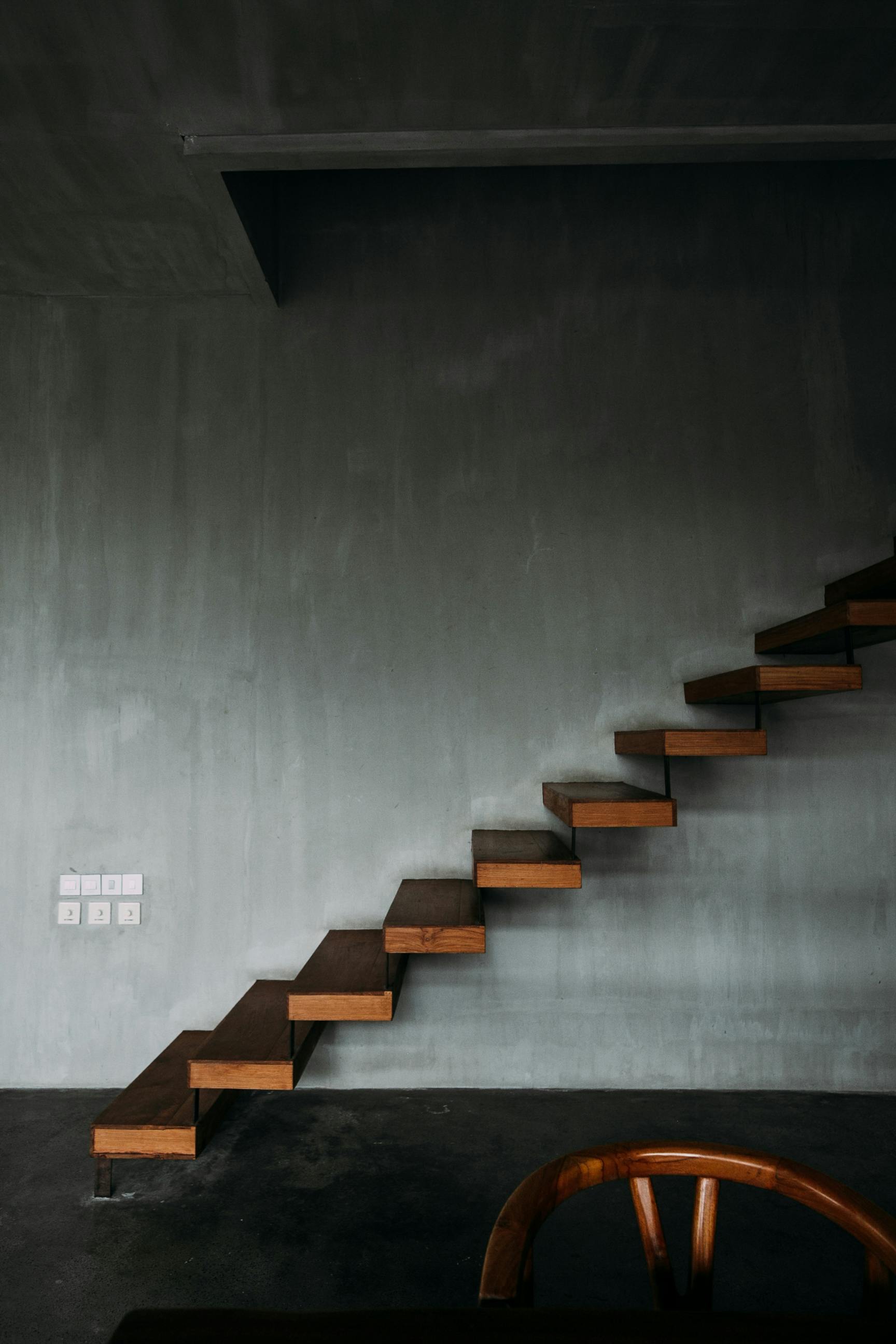 wooden staircase in modern apartment building