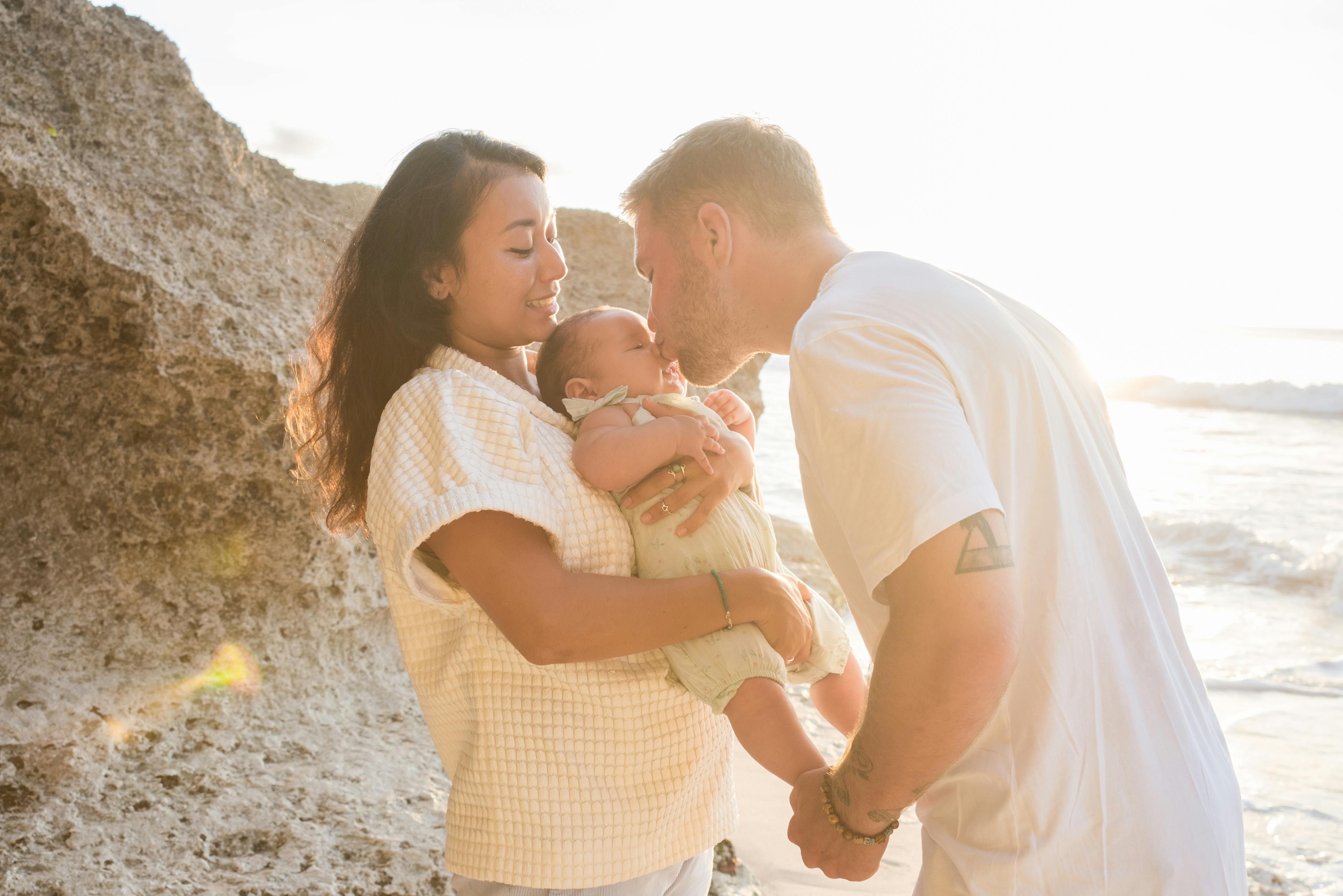 Parents Leading their Little Son by Hands · Free Stock Photo