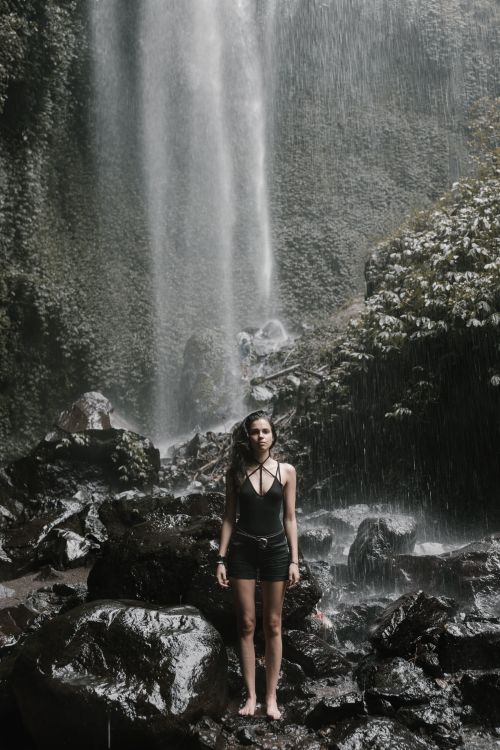 Woman Standing Near Waterfalls · Free Stock Photo